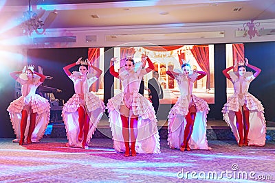 Girls dancers in beautiful stage costumes dancing at a festive banquet. Editorial Stock Photo