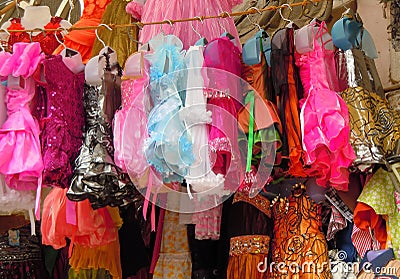 Girls dresses hanging up for sale Stock Photo
