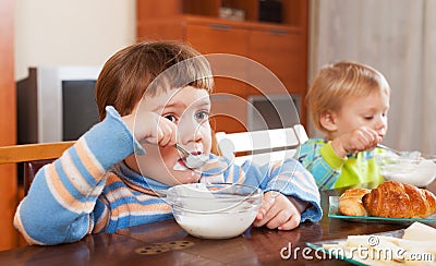 Girls eating dairy breakfast Stock Photo