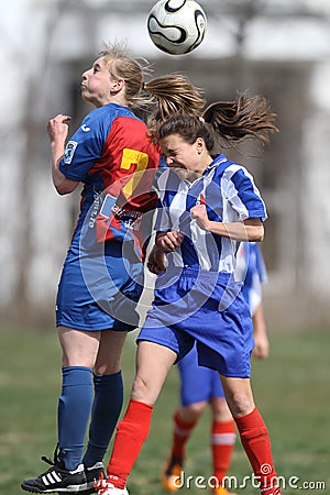 Girls fighting for ball during soccer game Editorial Stock Photo