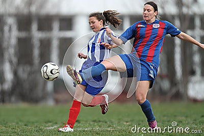 Girls fighting for ball during soccer game Editorial Stock Photo