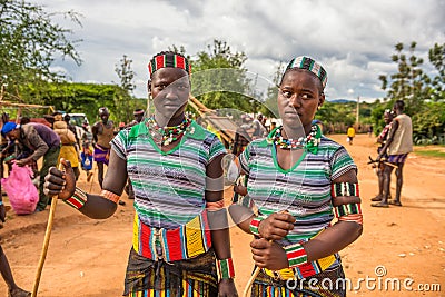 Girls from the Hamar tribe at a popular market in Turmi, Ethiop Editorial Stock Photo