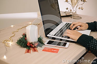 Girls hands typing on laptops keyboard on desk Stock Photo