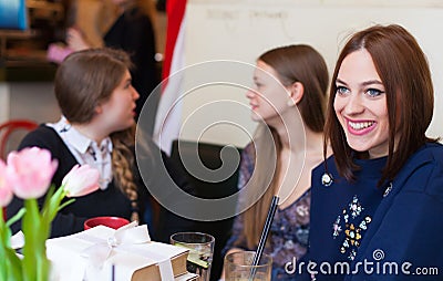 Girls having small talk in cafe Stock Photo