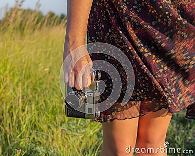 Girls legs and hand Stock Photo