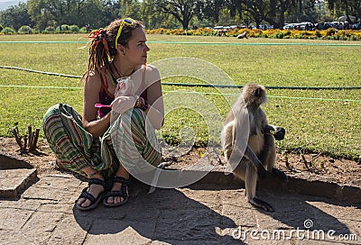 Girls with monkey Stock Photo