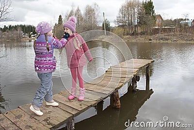 Girls near the lake Stock Photo