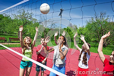 Girls play together volleyball on the playground Stock Photo