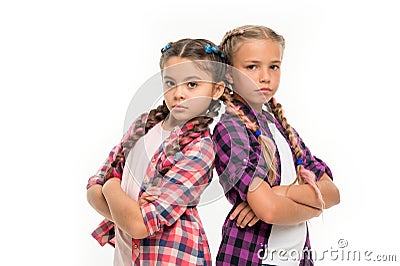 Girls sisters stand back to back confidently. Friendship support and trust. Sisterhood goals. Sisters together isolated Stock Photo