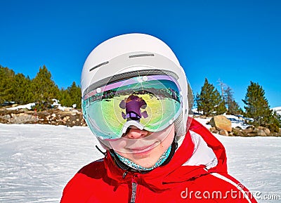 Girls in the ski helmet and goggles Stock Photo