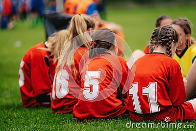 Girls in sports soccer team outdoors. Female physical education class on sports grass field. Editorial Stock Photo