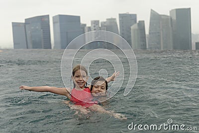 Girls in swimming pool Stock Photo