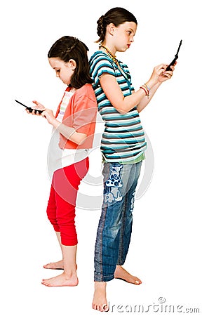 Girls text messaging Stock Photo