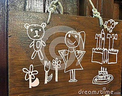 Girls on Woman wooden sign Stock Photo