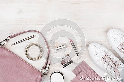 Girly fashionable spring and summer accessories on pastel wooden background Stock Photo