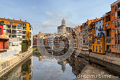 Girona skyline, cathedral and colorful houses along the Onyar river in the downtown, Catalonia, Spain Stock Photo