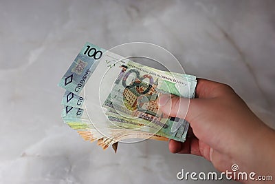 Give, take, banknotes of Belarusian rubles in a hand Stock Photo