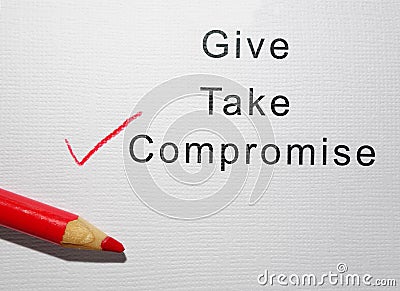 Give Take and Compromise text with red pencil check mark on paper Stock Photo