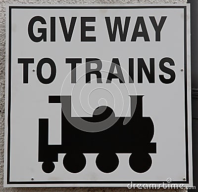 Give Way to Trains Sign Stock Photo