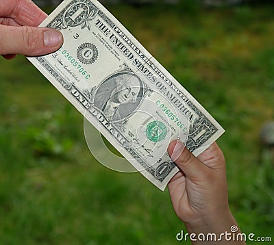 Giving dollar Stock Photo