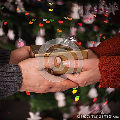 Giving a gift with love Stock Photo