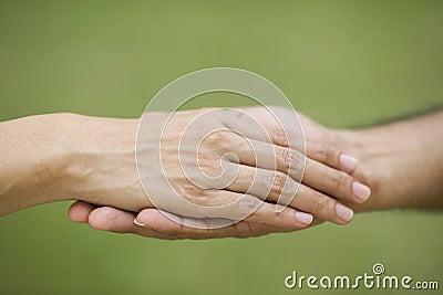 Giving a helping hand to another Stock Photo