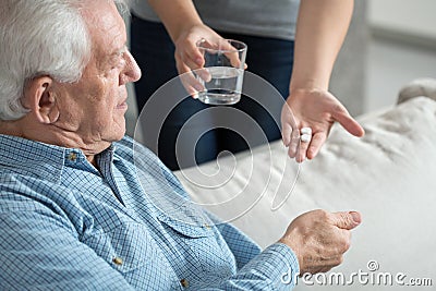 Giving the medicine Stock Photo