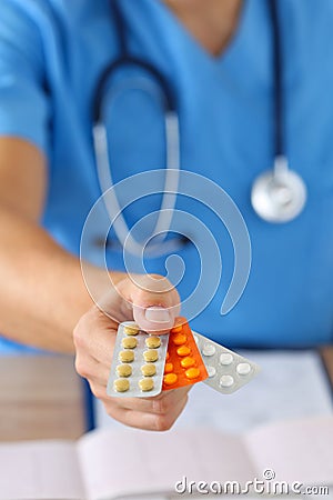 Giving or showing medications to patient Stock Photo