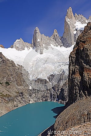 Glacial Lake Below Soaring Peaks Stock Photo