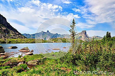 Glacial lake in hanging valley Stock Photo