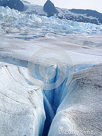 Glacial stream and crevasse. Stock Photo