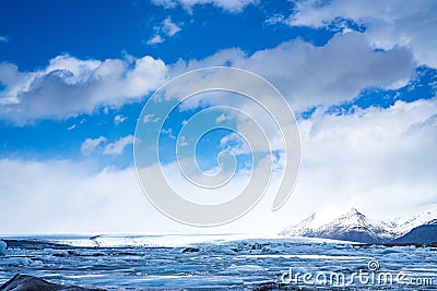 Glacier icebergs and water, clear blue sky Stock Photo