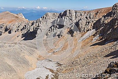 Glaciers survived until the end of summer in the shade of rocks on the north side of the Oshten mountain peak in the Caucasus Stock Photo