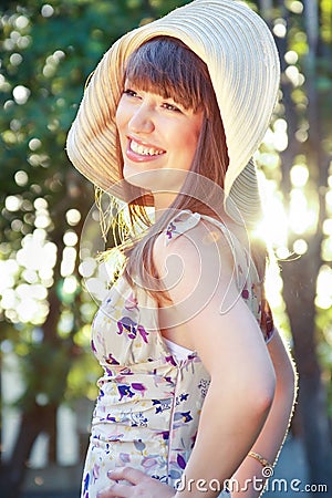 Glad girl in a hat Stock Photo