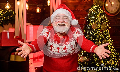 Glad see you. Celebrate new year. Stylish elderly man. Christmas traditions. Stick to traditions. Knitted sweater. Santa Stock Photo