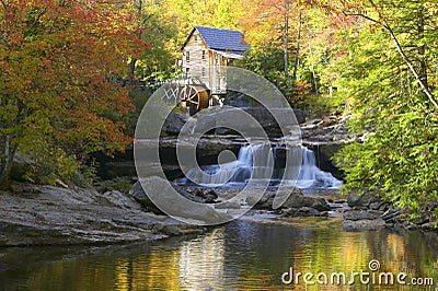 Glade Creek Grist Mil and autumn reflections and water fall in Babcock State Park, WV Stock Photo