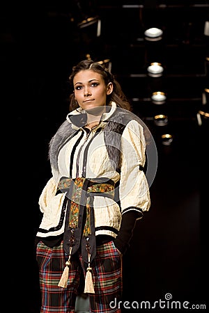 Glam female model at a fashion show(Russian Fashio Editorial Stock Photo