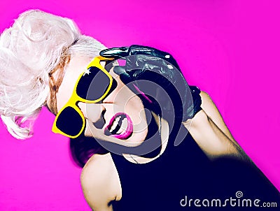 Glamorous blonde disco punk fashion style Stock Photo