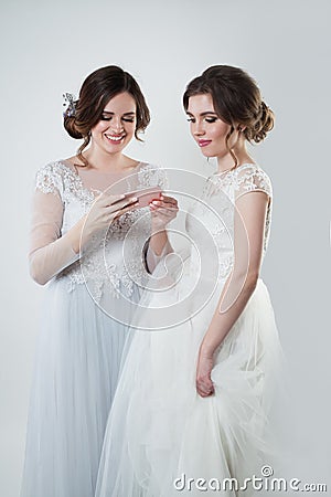 Glamorous bride with cell phone Stock Photo