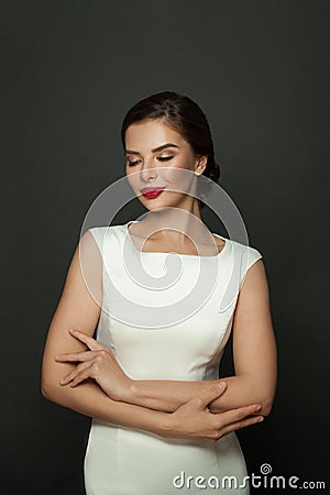 Glamorous stylish woman with trendy make up posing on black background, eyes closed Stock Photo