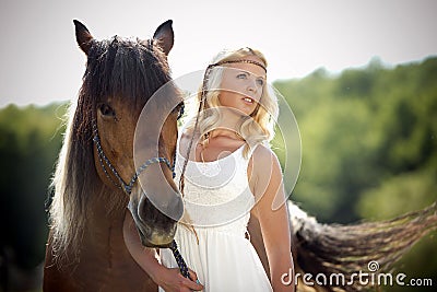 Glamorous woman with horse Stock Photo