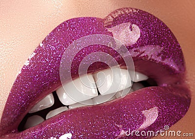 Glamour Magenta Gloss Lip Make-up. Fashion Makeup Beauty Shot. Close-up Female Sexy Full Lips with Celebrate Pink Gloss Stock Photo