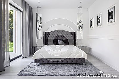 Glamour style bedroom in white and gray Stock Photo