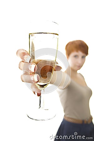 Glas of sparkling wine or champagne held by joung woman Stock Photo