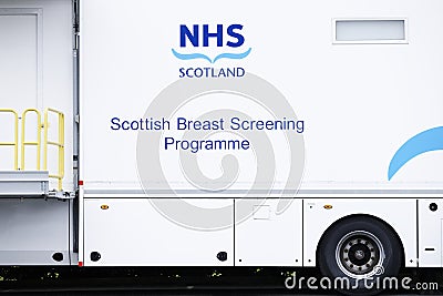 Glasgow, lanarkshire / Scotland - July 12th 2019: NHS Scottish Breast Screen Programme mobile vehicle unit parked in supermarket c Editorial Stock Photo