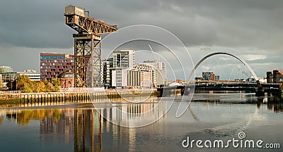 Clydeport Crane at Finnieston next to the Clyde Arc bridge in Glasgow Editorial Stock Photo