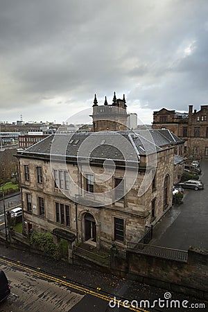 Typical English housing block underneath cloudy sky in Glasgow, Scotland Editorial Stock Photo