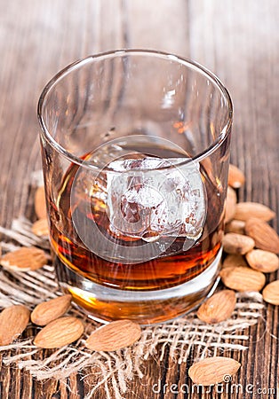 Glass with Amaretto and Ice Stock Photo