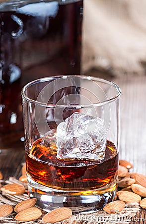 Glass with Amaretto and Ice Stock Photo