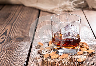 Glass with Amaretto and Ice Stock Photo
